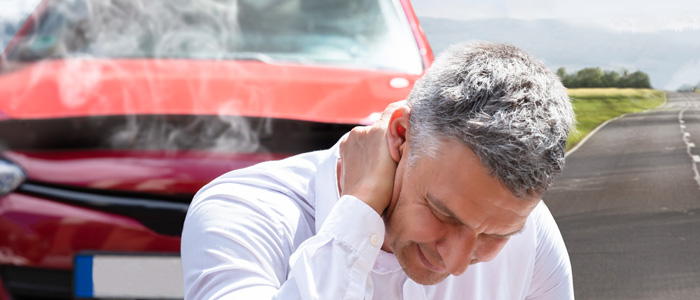 a man with neck pain from auto injury